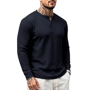 Close-up of navy ribbed texture Henley long sleeve shirt showing button neck detail