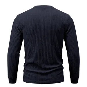 Back view of men's navy long sleeve T-shirt with vertical ribbed texture detail