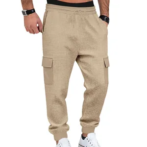 Men's khaki waffle knit cargo joggers with drawstring waist and multiple pockets