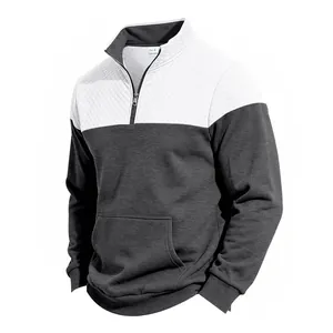 Detailed view of men's heavy jacquard color-block stand-collar sweatshirt with pocket