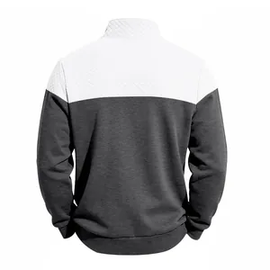 Back view of men's color-block sweatshirt with quilted jacquard texture and stand collar.