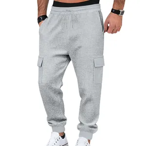 Men's waffle knit cargo joggers with drawstring waist and multiple pockets in light grey