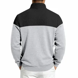 Back view of men's color-blocked stand-up collar sweatshirt with quilted texture.