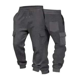 Detailed front and back view of men's grey waffle knit cargo jogger pants with pockets