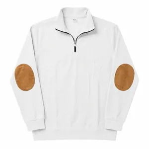 Close-up of white ribbed quarter-zip sweatshirt with brown elbow patch details