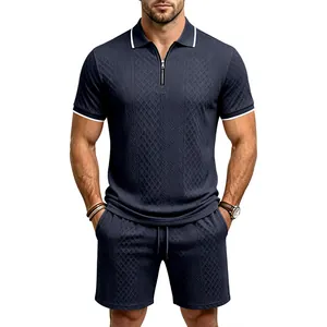 Close-up of men's navy blue diamond jacquard polo and shorts set on male model.