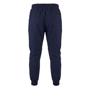 Back view of navy blue men's joggers featuring elastic waist and back zipper pocket.