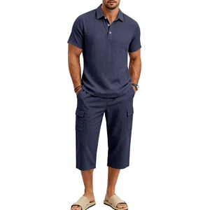 Full-body shot of men's navy blue cotton linen polo and cropped cargo pants set.