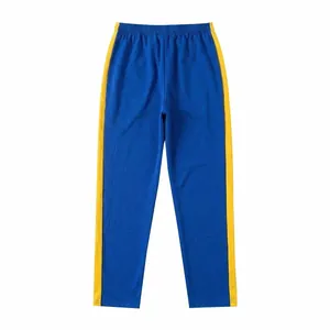 Straight-leg blue men's sports sweatpants featuring vibrant yellow side stripe details