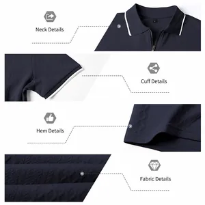 Detail view of the zipper neck, cuff, and diamond jacquard fabric of a navy men's polo.