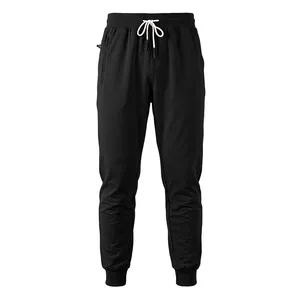 Men's black joggers featuring elastic drawstring waist and secure side zipper pockets.