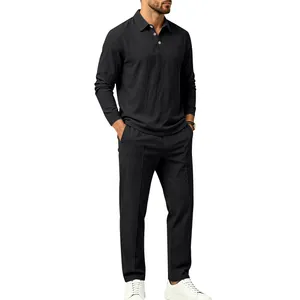 Detailed view of men's black cotton linen long-sleeve polo shirt and trousers set