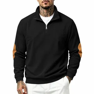Detail of men's half-zip ribbed sweatshirt featuring decorative brown elbow patches.