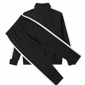 Back view of black men's tracksuit set featuring white contrast stripes on sleeves and pants