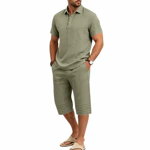 Detailed view of olive green cotton linen polo shirt and cropped pants set