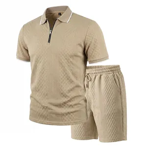 Detail of khaki men's diamond textured polo set with zip-up collar and drawstring shorts