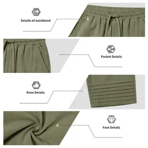 Detail view of men's olive green cotton linen cropped pants with drawstring and pleated knees.