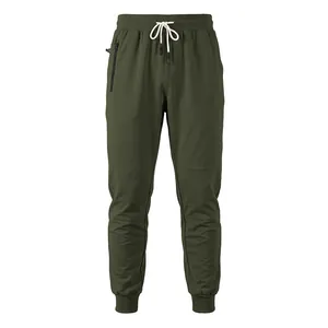 Front view of men's olive green joggers with white drawstring and zipper pocket.