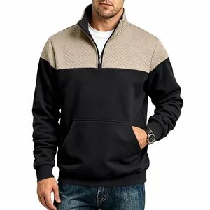 Detailed view of men's heavyweight color-block quilted quarter-zip sweatshirt.