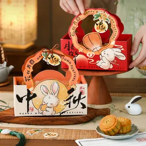 Detailed view of festive Mid-Autumn mooncake boxes featuring cute rabbit illustrations