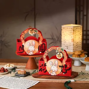 Detail of red Mid-Autumn gift boxes with rabbit theme and decorative handles