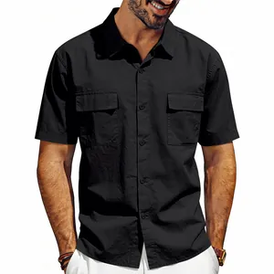 Detailed macro view of men's black short sleeve utilitarian work shirt with two pockets