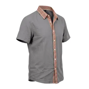 Side view detail of a men's short sleeve grey linen shirt with vintage ethnic trim