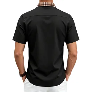 Back view of a men's black short-sleeved shirt with a contrast plaid collar design.