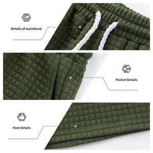 Gros plan du tissu jacquard vert montrant les détails de la taille, de la poche et du bas.