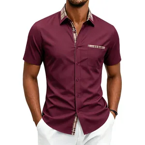 Detail view of men's burgundy short sleeve shirt with plaid contrast on collar and pocket