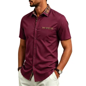 Detail of burgundy men's short sleeve shirt with plaid contrast collar and pocket