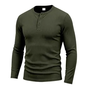 Detailed macro view of olive green waffle knit texture on mens long sleeve Henley T-shirt