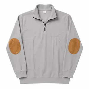 Grey vertical ribbed half-zip sweatshirt featuring brown oval elbow patches design.