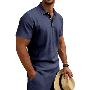 Close-up of men's navy blue linen polo shirt showing premium breathable texture.