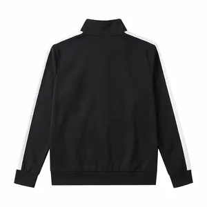 Detailed back view of men's black sports jacket with white contrast stripes on sleeves