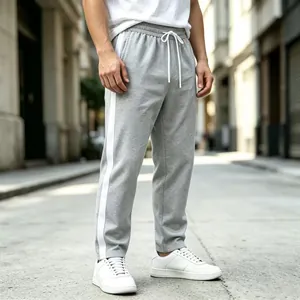 Men's grey straight-leg sweatpants featuring white side stripes and drawstring waist.