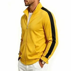 Detail view of yellow men's sports jacket with black sleeve stripe and stand collar.