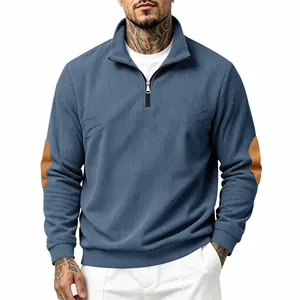 Detail of men's ribbed half-zip sweatshirt featuring casual brown elbow patches.