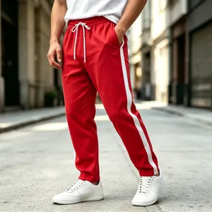 Detailed view of red men's sweatpants with white side stripes and drawstring