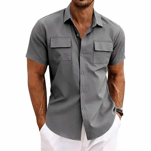Detail of men's short-sleeved cargo shirt in grey with dual chest pockets