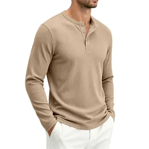 Close-up detail of a men's khaki waffle knit Henley long sleeve shirt with buttons