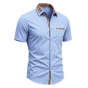 Men's light blue short sleeve shirt with plaid contrast collar and chest pocket
