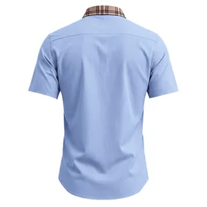 Detailed back view of a light blue men's short sleeve shirt with classic brown plaid collar