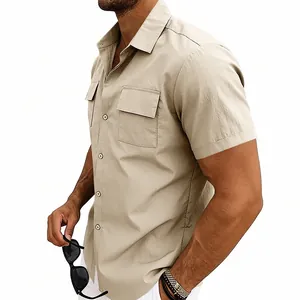 Macro view of men's khaki quick-dry cargo shirt showing lapel and pocket detail
