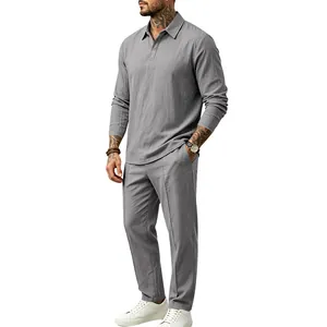 Full view of men's gray cotton linen two-piece set with long sleeve polo and pants.
