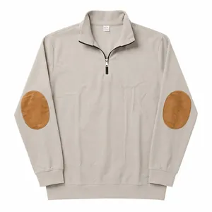 Detailed view of men's vertical ribbed half-zip sweatshirt with elbow patches.