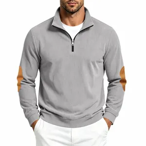 Men's grey ribbed half-zip sweatshirt with stylish brown elbow patches on white background.