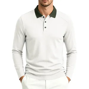 Close-up view of men's textured long sleeve Polo shirt with dark green contrast collar