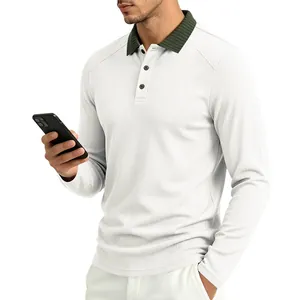 Close-up detail of men's white textured long-sleeve polo shirt with green ribbed collar