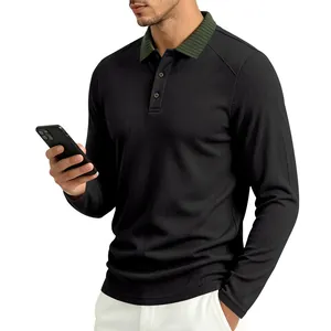 Close-up of men's black textured long sleeve Polo shirt with green contrast collar